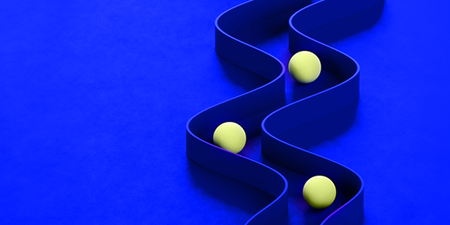 Yellow balls passing through a maze